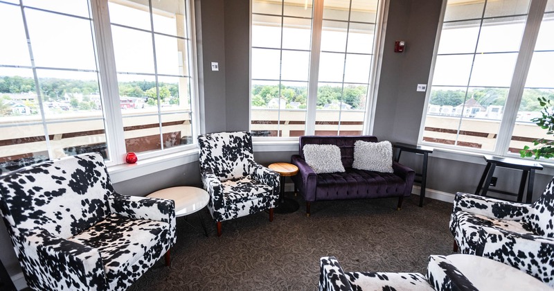 Interior, lounge armchairs and small tables