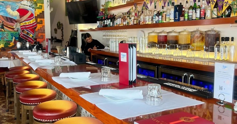 Interior, bar counter featuring place settings