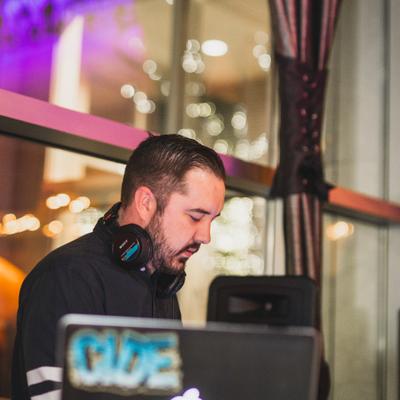 A DJ playing  music.