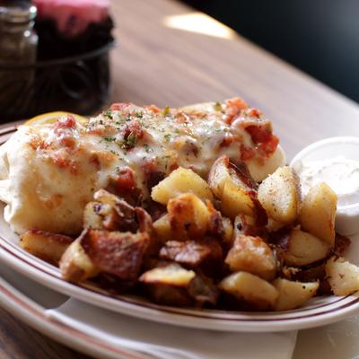 Breakfast Burrito, served with potatoes.