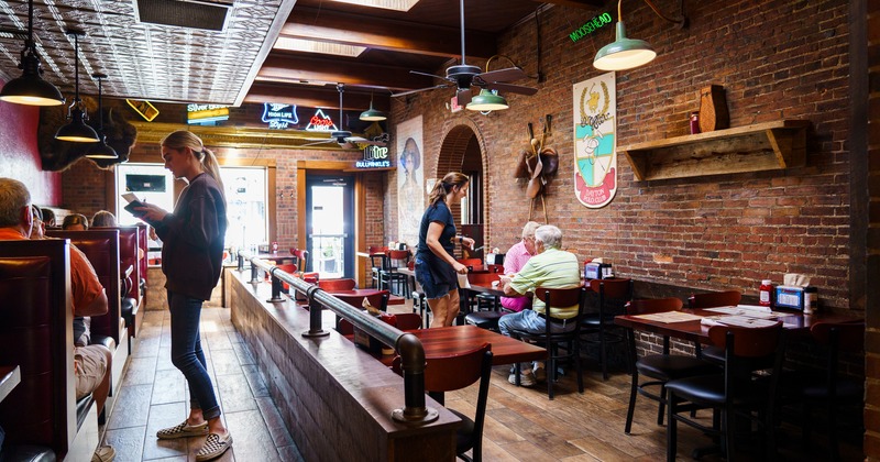 Interior, diner area, people, bar