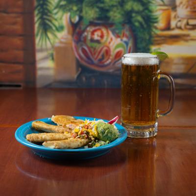 Manchengo cheese quesadillas served with beer