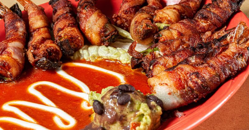 Bacon-wrapped jumbo shrimp plate, closeup