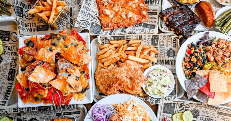 An assortment of meal plates on a table, overhead view