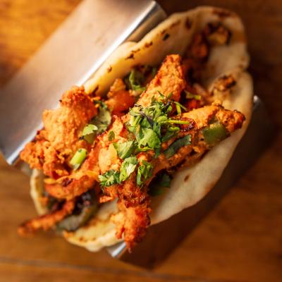 Butter chicken taco, top view.