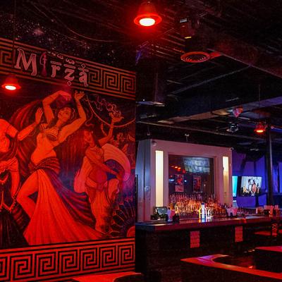 Seating area with a wall mural.