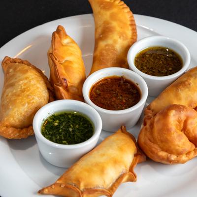 Empanadas with dips.