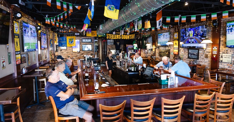 Customers sitting at the bar
