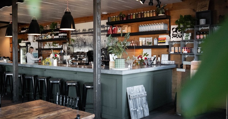 Interior, tables and chair near bar