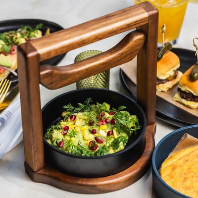 Guacamole with serrano peppers, cilantro, lime, pomegranate, mango, and pineapple.
