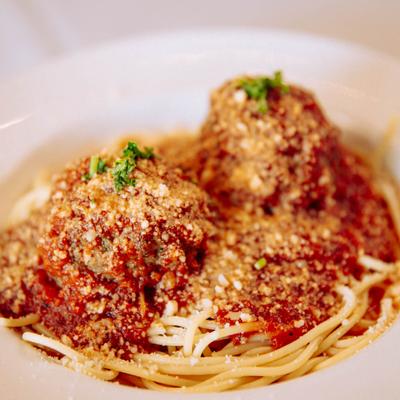 Spaghetti and meatballs in marinara basil sauce.