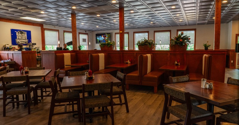 Interior, tables, chairs and booths all lined up