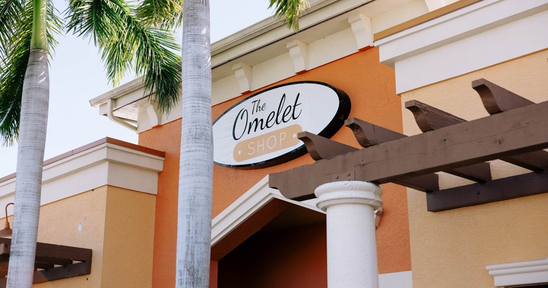 The Omelet Shop, exterior, fascia sign on the building