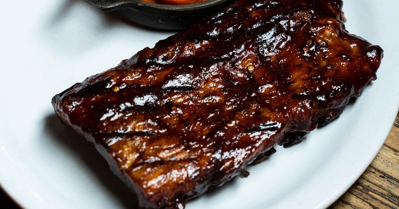 BBQ ribs with a side of glazed carrots