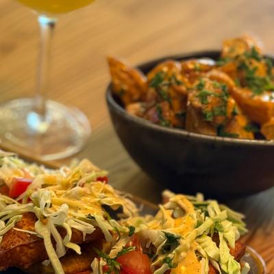Tostones Con Queso Frito with Patatas Bravas and  Pineapple Lemon Drop Martini.