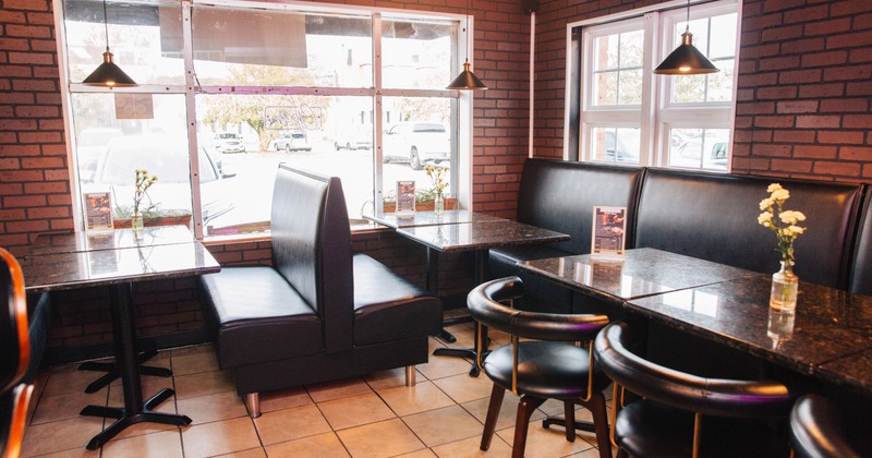 Interior, seating area with booths and tables
