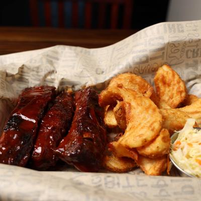 3 Bbq ribs and tornado Fries with coleslaw.