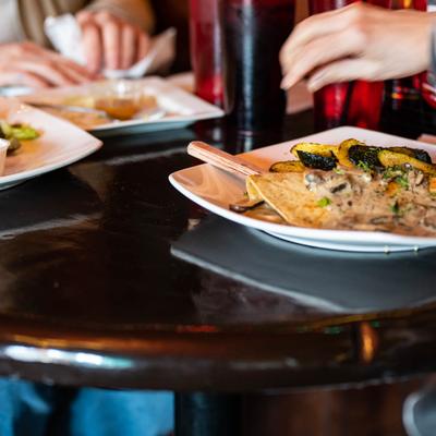 Customers eating their food, closeup