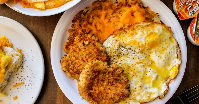 Salmon patties, fried eggs, cheddar and hashbrowns