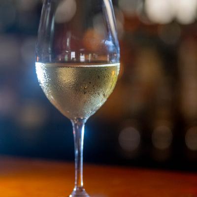 A glass of white wine.