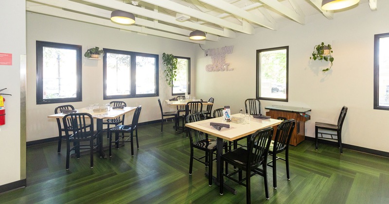 Restaurant interior, dining room with set tables