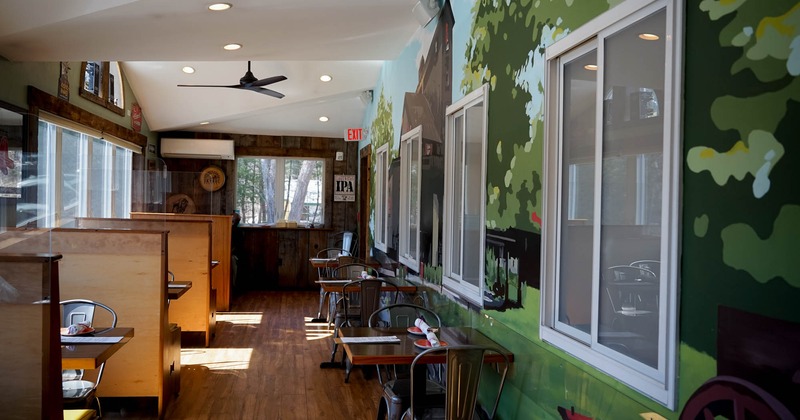 Interior, dining tables and booths ready for guests