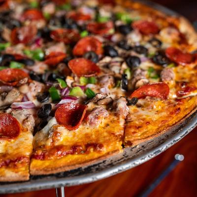 Supreme pizza, close up.