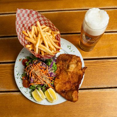 Pork Schnitzel, with salad, and fries.