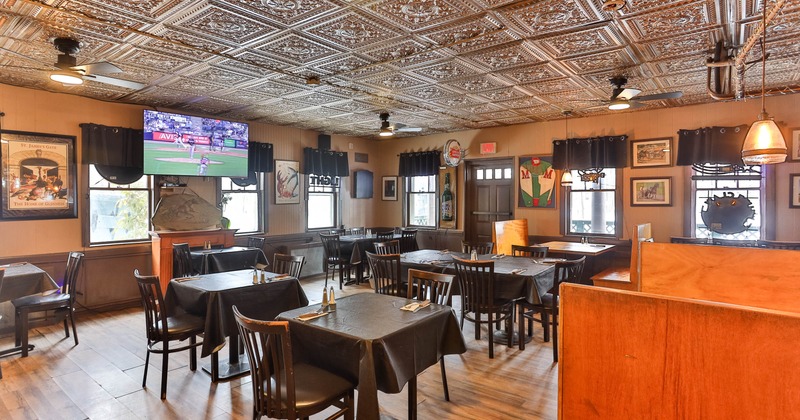 Interior, tables and chairs in dining area