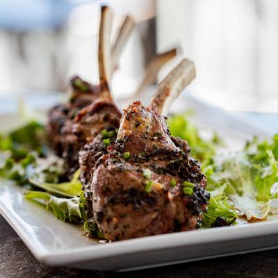 Lamb chops served with fresh herbs
