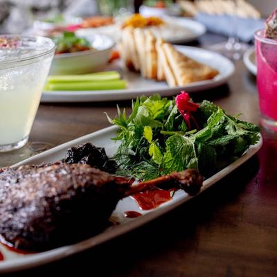 Duck confit with herb salad.