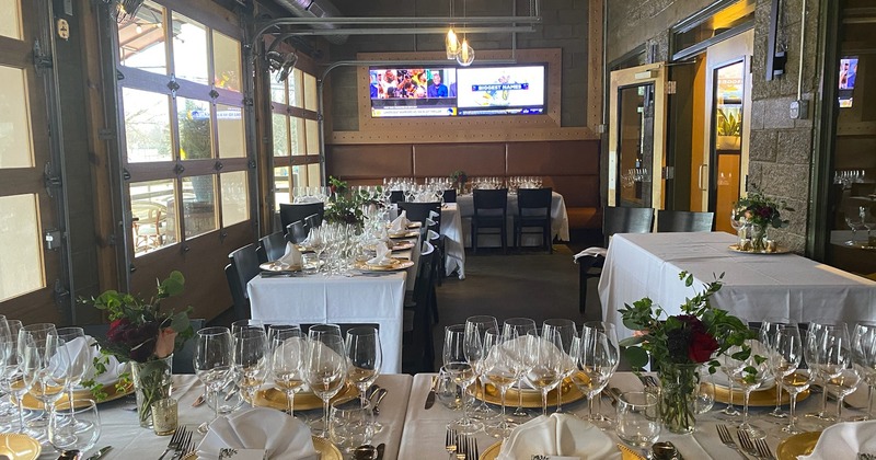 Patio enclosure, tables set and decorated for a banquet