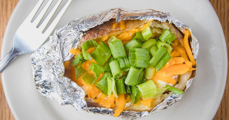 Grilled meat, dip, fries, salad