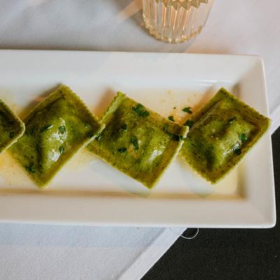 Artichoke Asparagus Ravioli served , top view