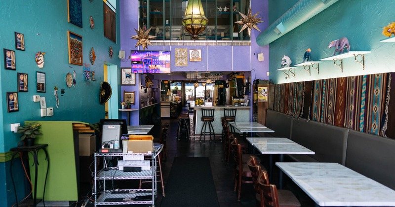 Interior, banquette seating, various wall decorations