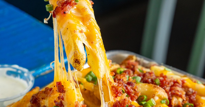 Loaded Fries, with cheese, bacon, and scallions