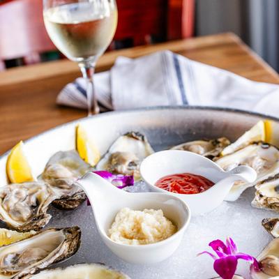 Served Oysters and white wine.