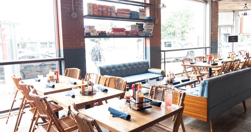 Interior, dining area with set dining tables and seating