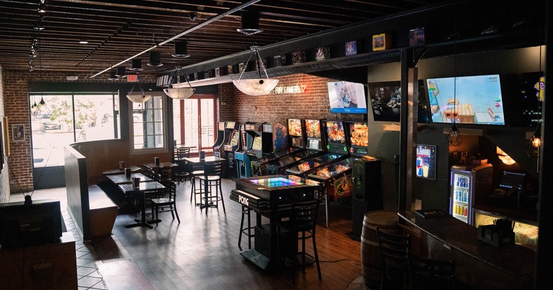 Interior, seating area and game machines, TVs on the wall