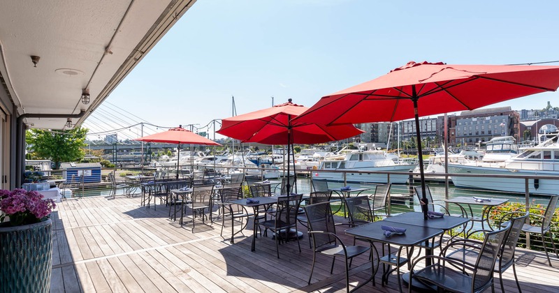 Outdoor dining area with red umbrellas