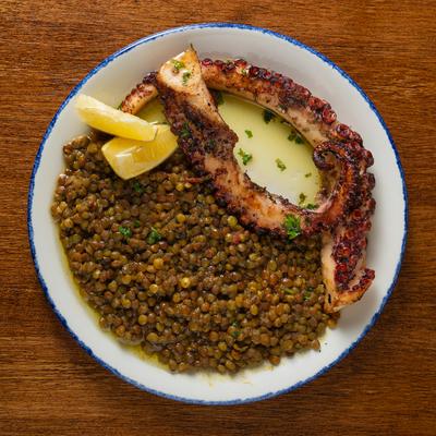 Grilled octopus, with curried lentils.