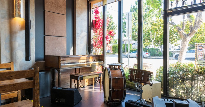 Interior, drumm's and piano in side window, music area