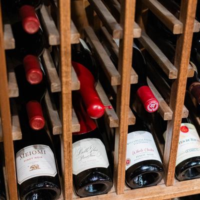 Wine bottles on racks.
