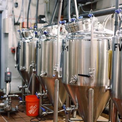 Stainless steel brewing tanks.