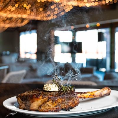 Grilled Tomahawk Steak, with butter.