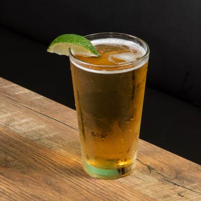 beer in glass with lime.
