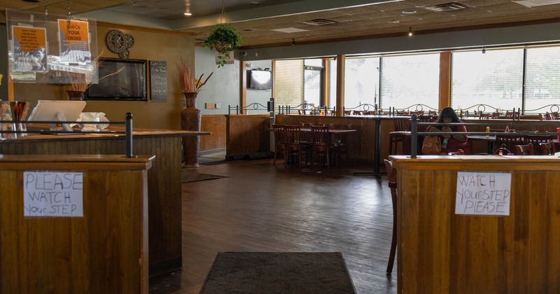 Interior, tables and chairs ready for guests