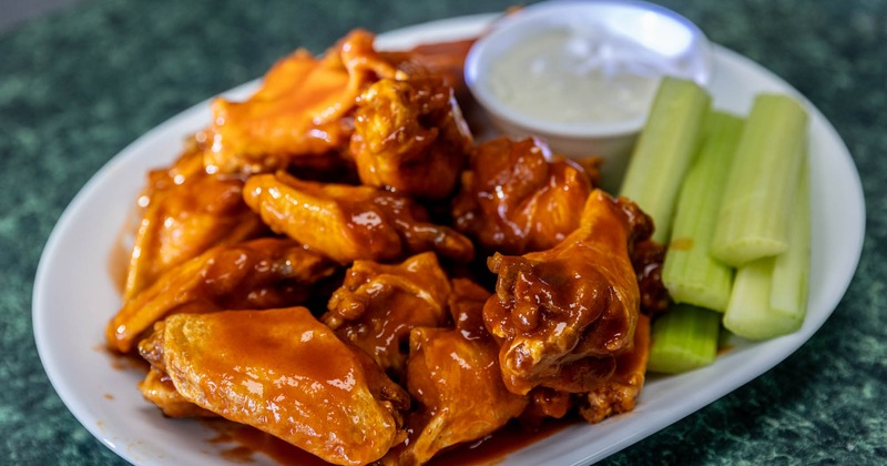 Buffalo wings, with celery and dip