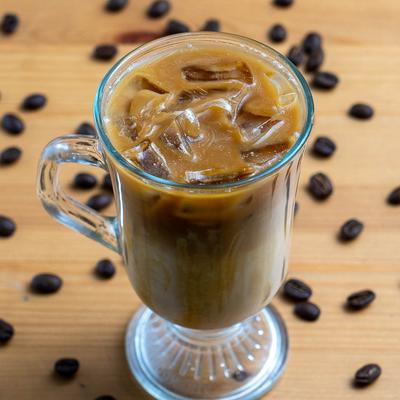Iced latte with caramel drizzle.