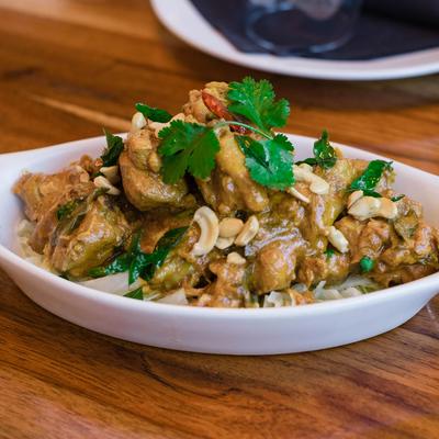 Indian chicken korma with cashews and cilantro.